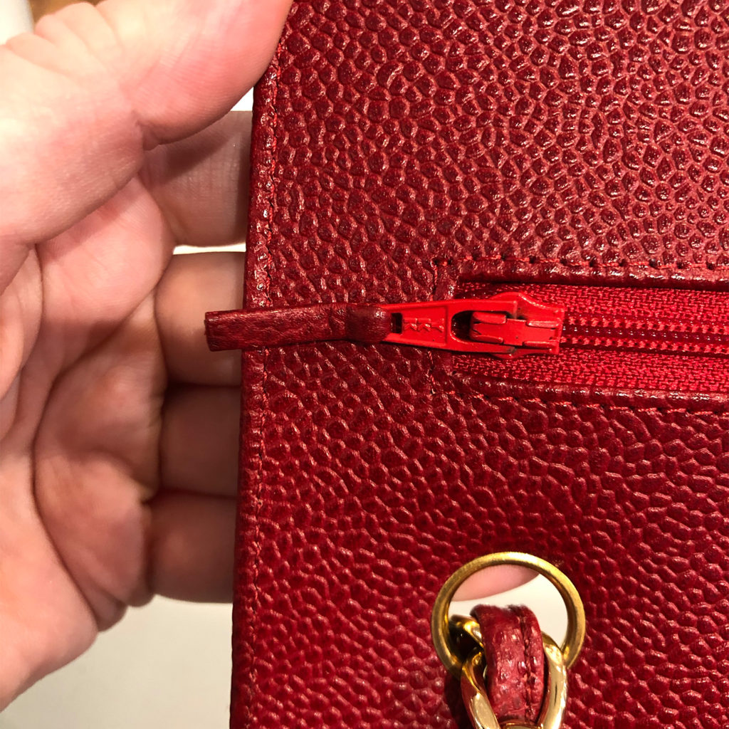 Chanel fake YKK zipper pull hardware